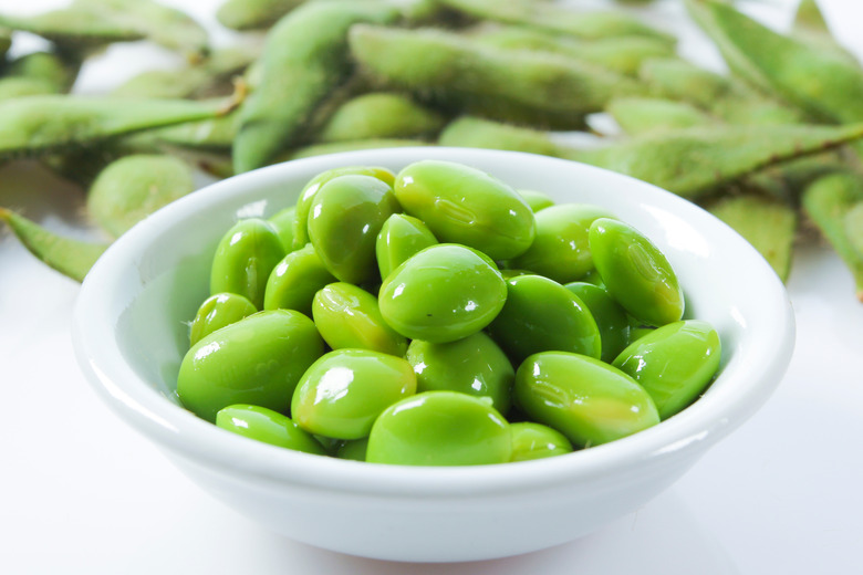 Green edamame beans in a bowl.