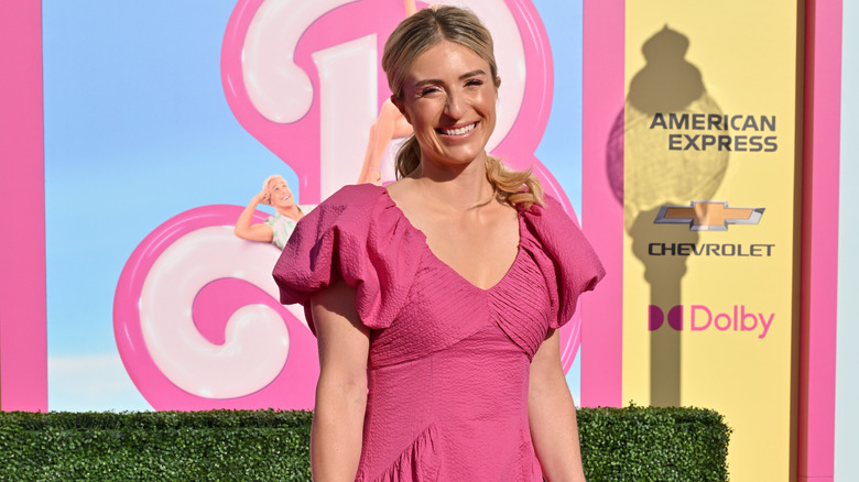 Jasmine Roth smiles at an event for the Barbie movie.