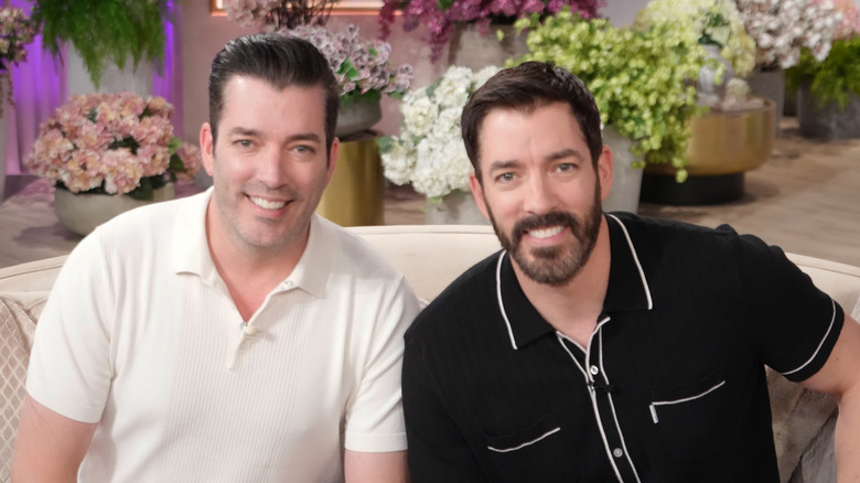 Jonathan Scott and Drew Scott appear on the Jennifer Hudson Show in 2024.