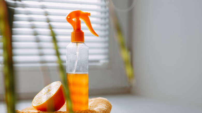 Orange peel spray on a white tabletop