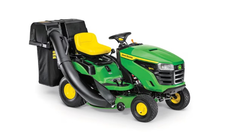 A product image of the John Deere S100 with bag attachments on a white background.