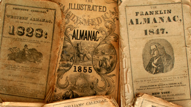 A variety of very old American almanacs on yellowing paper