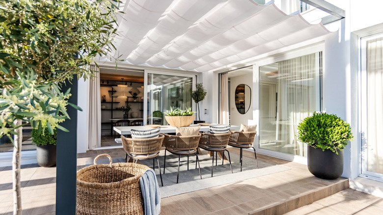Outdoor patio with dining area.