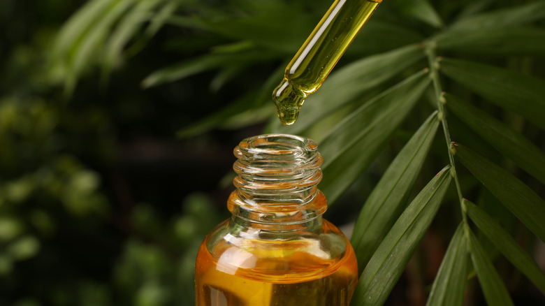 essential oil with a dripper