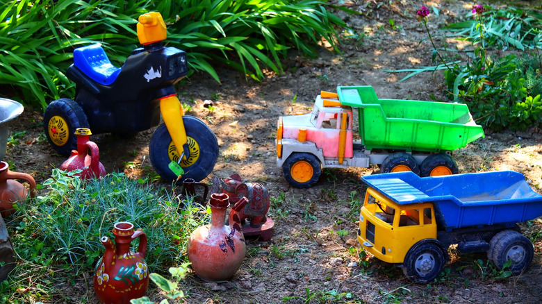 Toys left out in a yard.